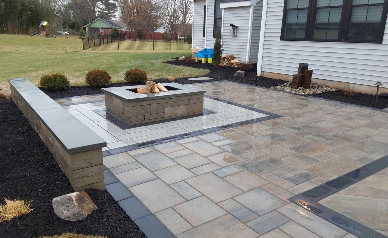 Custom concrete patio with decorative elements in Hamden, CT